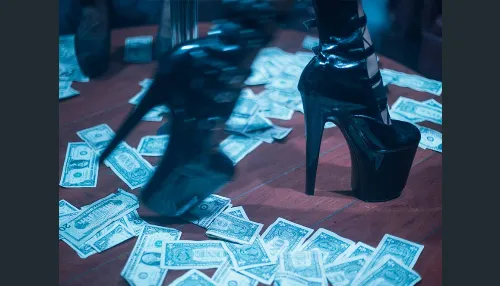 False Nails and Dollar Bills: the Woman Photographing Strippers How They Want to be Seen