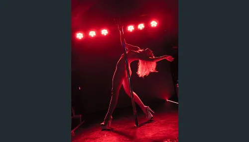 False Nails and Dollar Bills: the Woman Photographing Strippers How They Want to be Seen